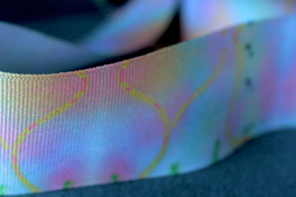 Desert-themed grosgrain ribbon for gifts and crafts. Abstract with yellow lines, pink dashes and black dots. 