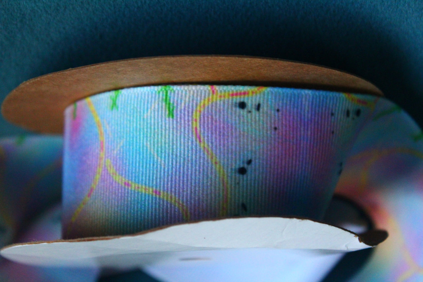 Desert-themed grosgrain ribbon for gifts and crafts. Abstract with yellow lines, pink dashes and black dots. 