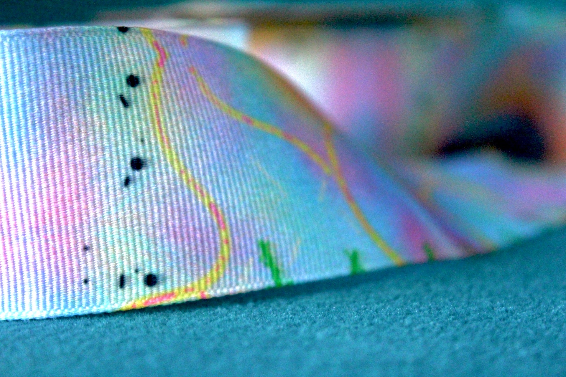 Desert-themed grosgrain ribbon for gifts and crafts. Abstract with yellow lines, pink dashes and black dots. 
