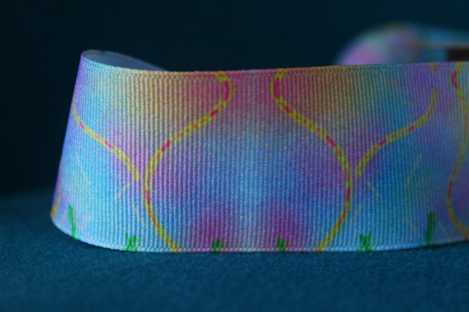 Desert-themed grosgrain ribbon for gifts and crafts. Abstract with yellow lines, pink dashes and black dots. 