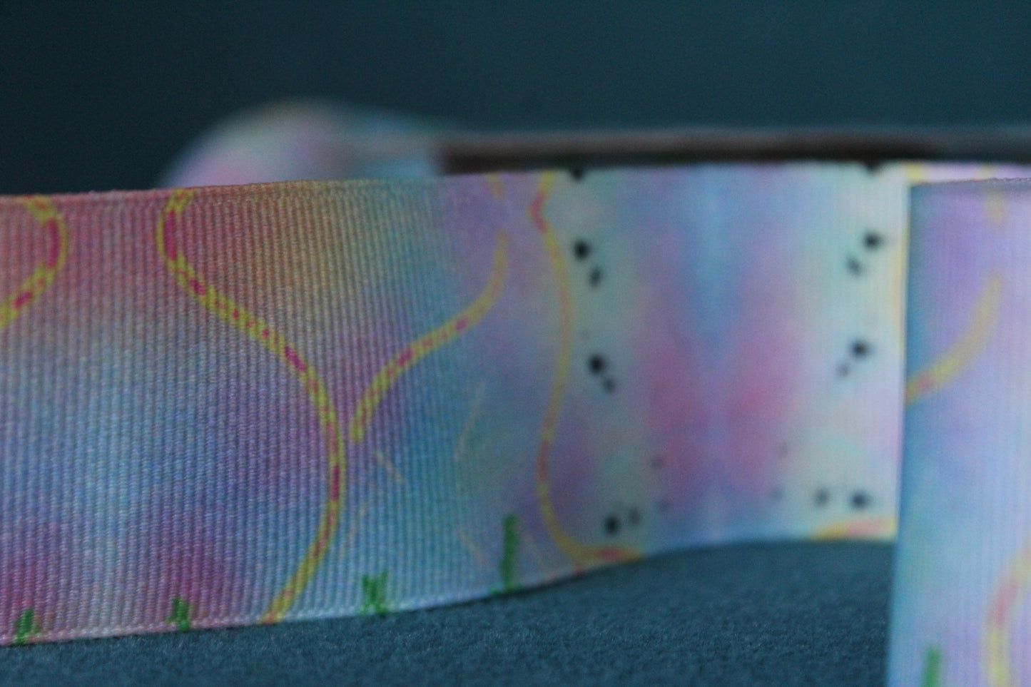 Desert-themed grosgrain ribbon for gifts and crafts. Abstract with yellow lines, pink dashes and black dots. 